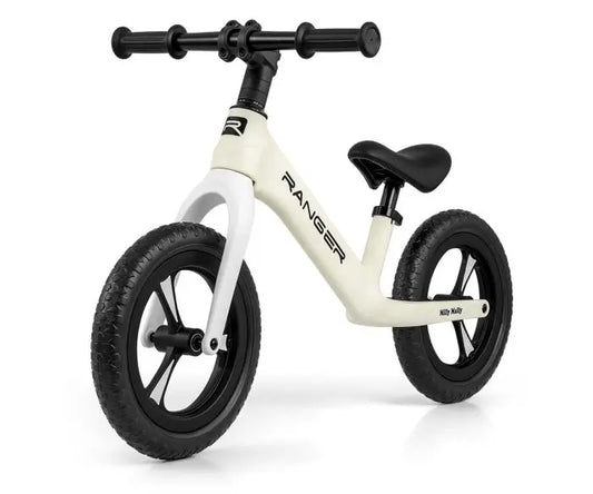 A white and black balance bike for young explorers, featuring adjustable seat height, bearing-mounted steering, lightweight composite frame, slip-resistant handles, soft contoured seat, and 12-inch puncture-proof EVA wheels.