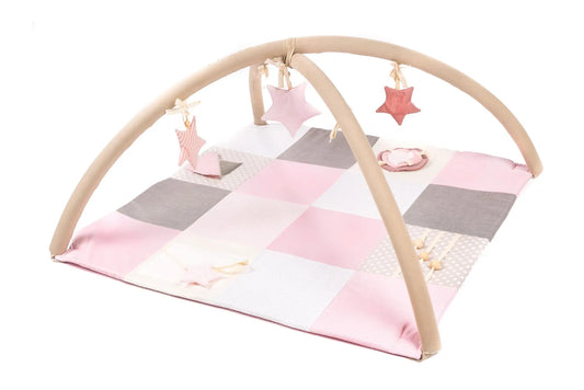 Handmade baby activity mat with arches, stimulating toys, and eco-friendly cotton. Encourage sensory exploration for newborns and up. 100x100 cm in pink.