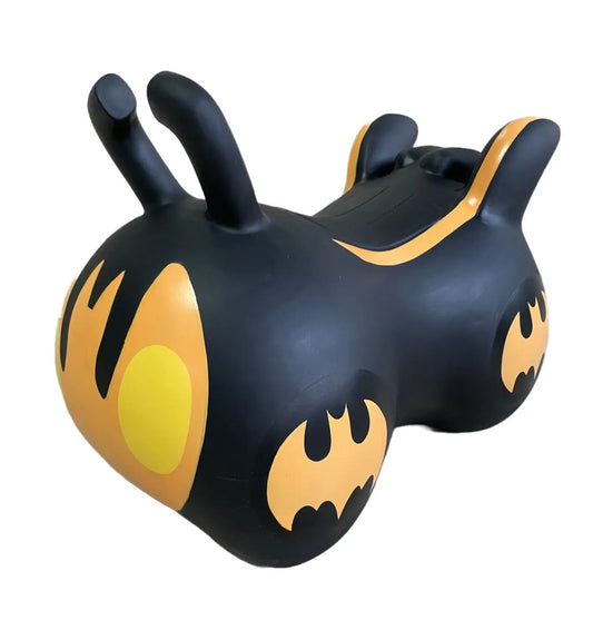 A black and yellow Batmobile-themed hopping toy promoting active play for kids, featuring a durable design, suitable for indoor and outdoor use. Dimensions: 42 x 60 x 20 cm.
