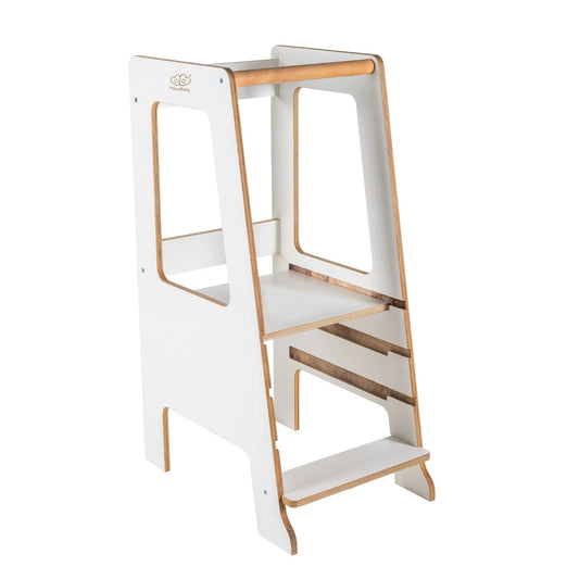 Plywood Kitchen Helper Scandi - White: A sturdy birch plywood kitchen helper with adjustable platform heights for children, showcasing Scandinavian minimalism with white smooth sides and wooden edges.