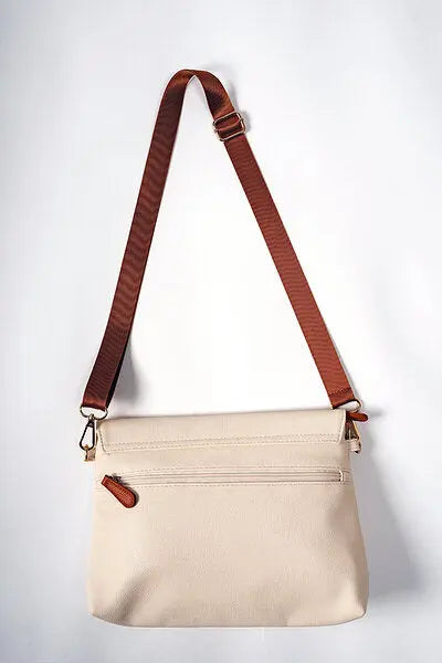 A versatile handbag Cappuccino by Ally Scandic, featuring long and wrist straps for flexible carrying. Lightweight at 0.3 kg, with a removable wet wipes pocket. Designed for comfort and style.