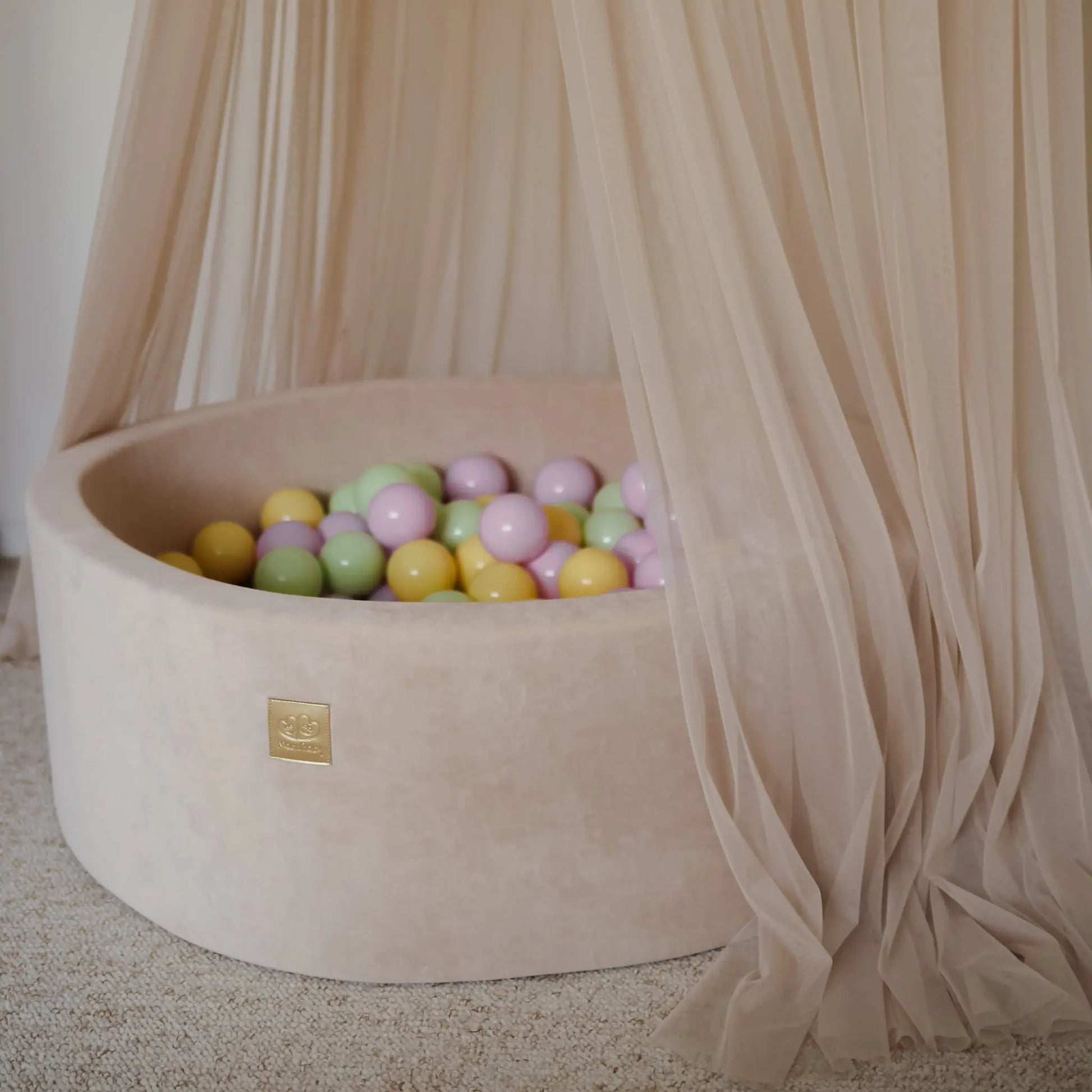 A round foam ball pit with colorful balls inside, featuring a soft velour cover. MeowBaby® Baby Foam Ball Pit 30 cm - Spring, ideal for motor skills development and sensory therapy.