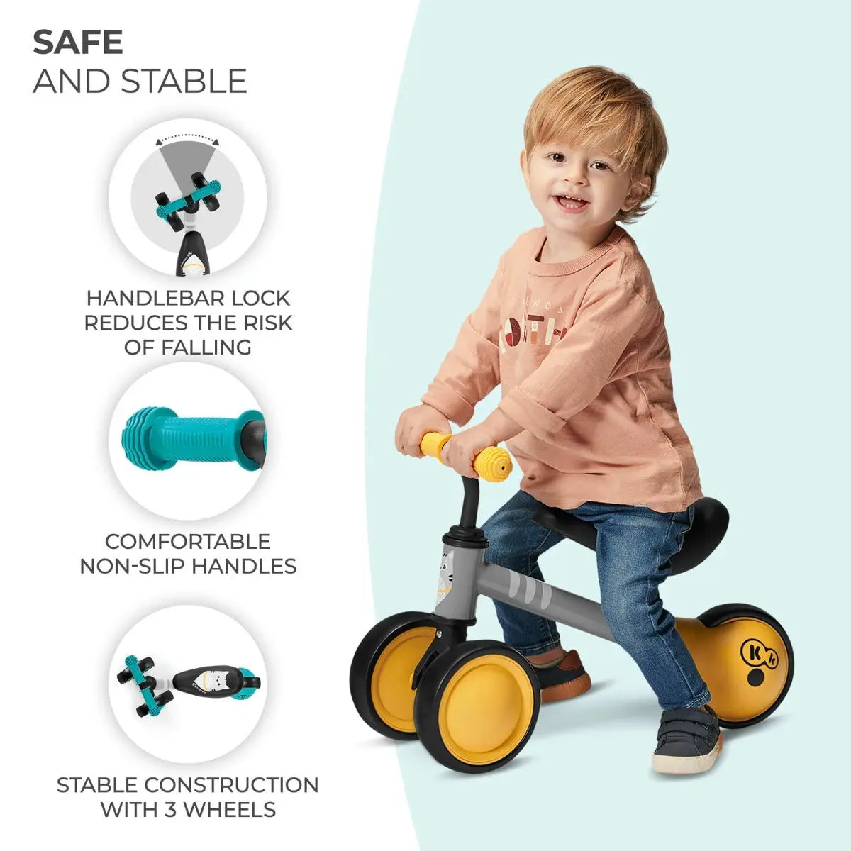 A child on a balance bike with a kitten print, rubber non-slip handles, adjustable saddle, ball-bearing rear wheel, and strong steel frame.