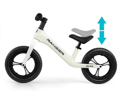 A white and black balance bike for young explorers, featuring adjustable seat height, bearing-mounted steering, lightweight frame, slip-resistant handles, soft contoured seat, and 12-inch puncture-proof wheels.