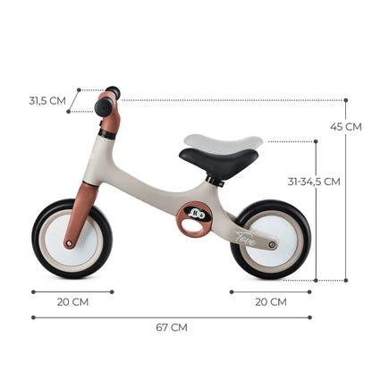 A lightweight TOVE balance bike with puncture-resistant foam wheels, adjustable seat, and two carry handles for toddlers aged 18 months and up.