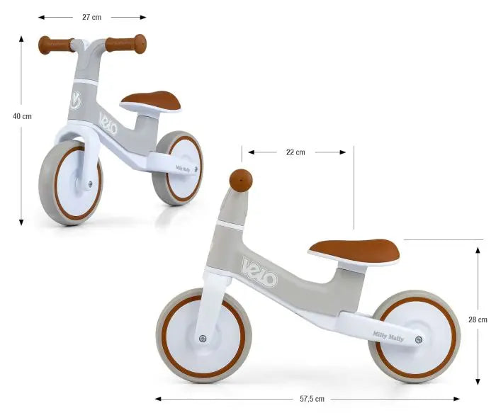 A close-up of VELO balance bike, showcasing sturdy frame, puncture-proof 7-inch wheels, steering limiter, and comfortable seat for ages 18+ months.