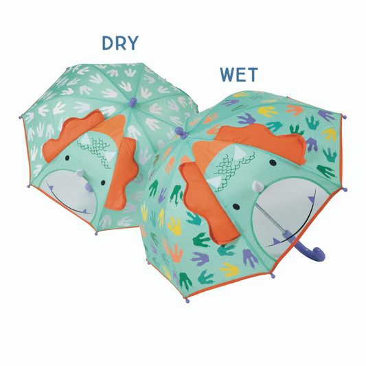 Color Changing 3D Umbrella - Dinosaur with cartoon dinosaur faces, featuring fun 3D elements and a Velcro fastener for easy storage. Suitable for ages 3+.