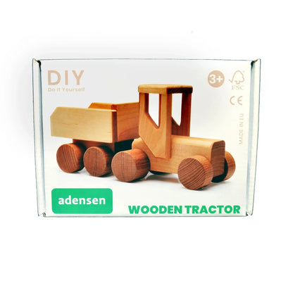 A wooden DIY tractor set in a box, showcasing Tonu, a durable and creative toy for children aged 3 and above. Crafted from birchwood, it encourages hands-on learning and imaginative play.