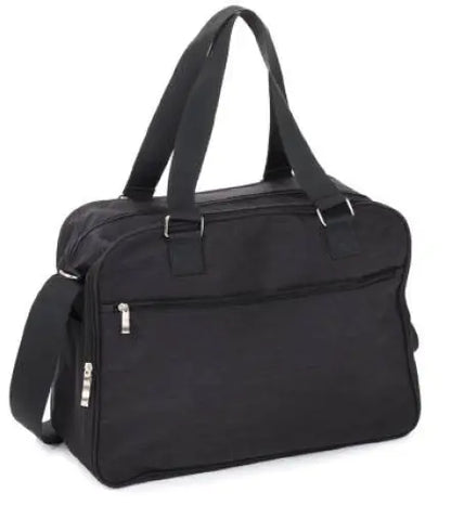 Black diaper bag with wide strap, ideal for on-the-go parents. Spacious main compartment, multiple pockets, and included changing mat for convenience. Features carabiners, bottle holder, and pacifier bag.