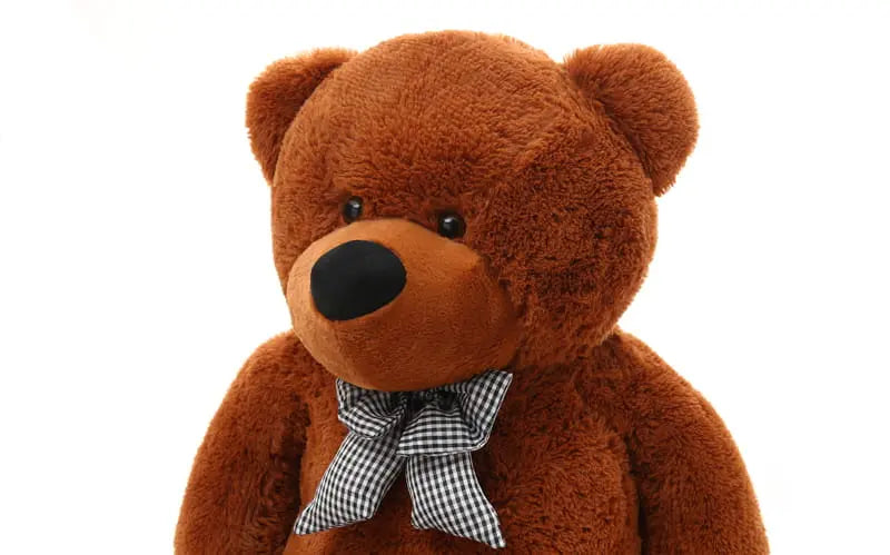 A large, cuddly TEDDY bear measuring 180 cm, made of soft fur, with a bow, ideal for hugging. EU safety certified, washable, and a lasting friend for your child.