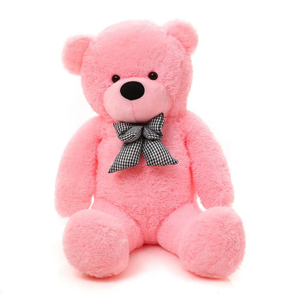 A giant 200 cm TEDDY bear made from soft fur, with a black and white checkered bow, ideal for safe hugging. EU safety certified, washable, and a lasting friend for your child.