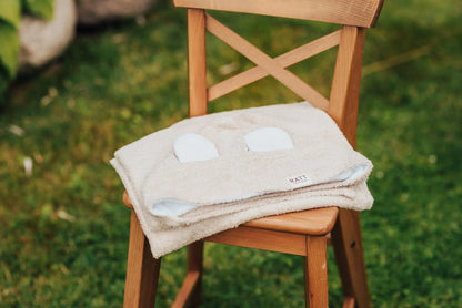 A hooded baby bath towel with TEDDY ears, made of OEKO-TEX certified bamboo terry material. Perfect for infants, hand-made in Europe for superior quality.