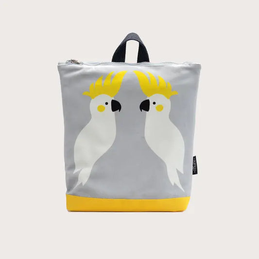 Kids backpack - Cockatoo: Grey and yellow bag with white bird design, velvet top, waterproof polyester bottom, beige shoulder straps, zipper closure, 2 slip pockets. Ideal for 4-10-year-olds.