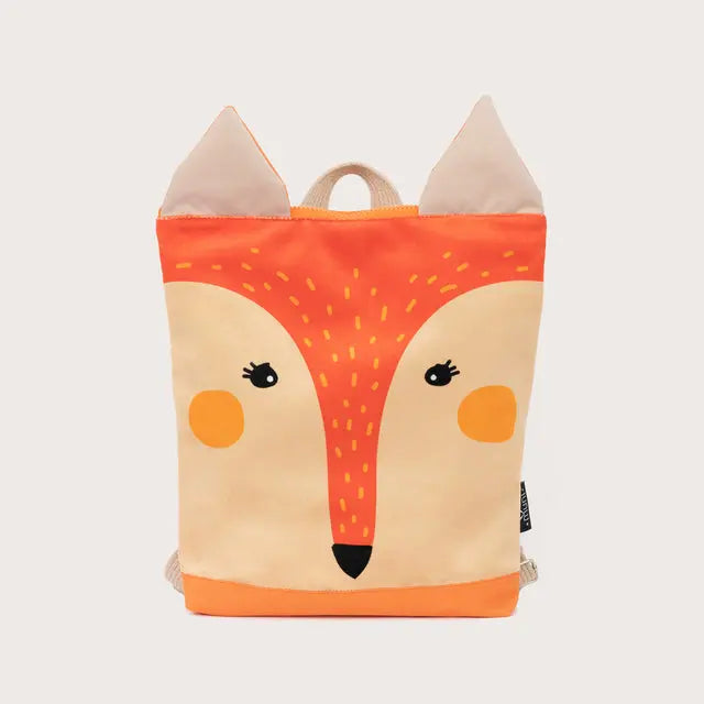 Kids backpack featuring a fox face design. Velvet top with Fox print, waterproof polyester bottom in orange. Adjustable beige straps, zipper closure, and two interior pockets. Dimensions: Small - 29x26cm, Large - 35x30cm.