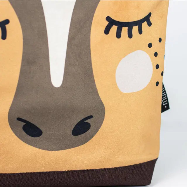 Close-up of a cartoon horse kids backpack, showcasing velvet top with horse design, waterproof polyester bottom, adjustable beige shoulder straps, and zipper closure with slip pockets inside.