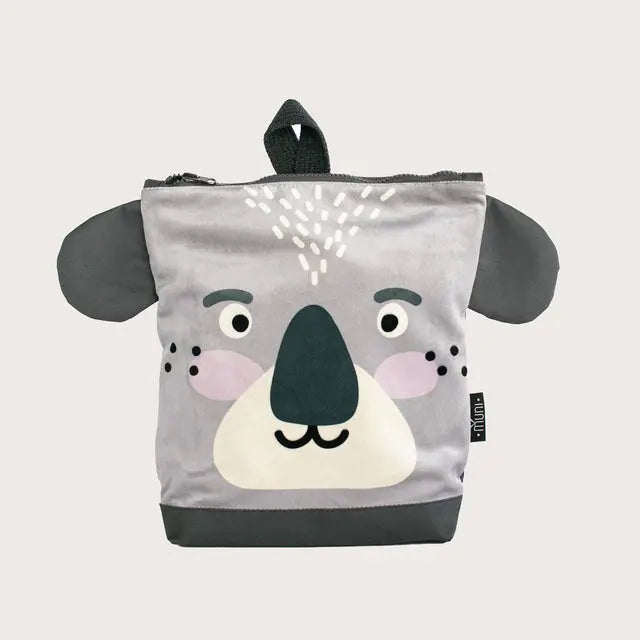 A grey koala-themed kids backpack with a face design, velvet top, waterproof polyester bottom, and adjustable beige shoulder straps. Perfect for outdoor adventures with two inside slip pockets.