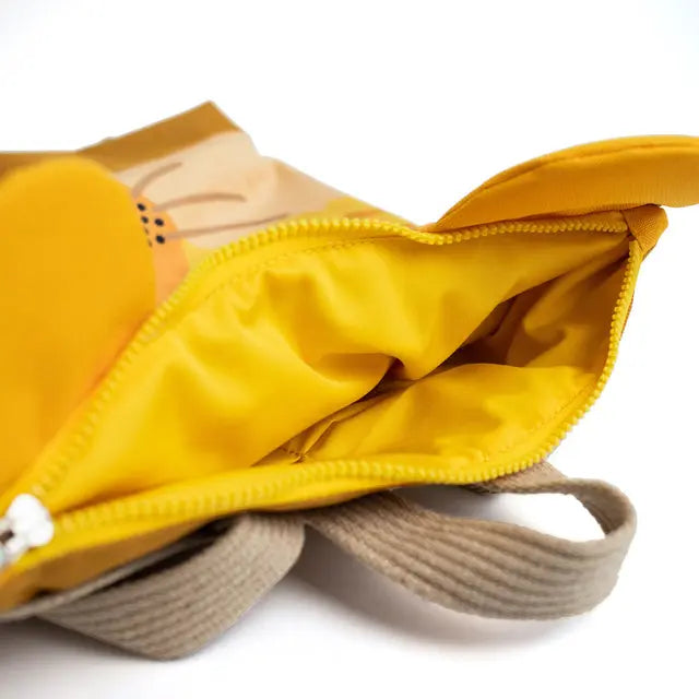 A yellow lion-themed kids backpack with a zipper closure and cartoon face design. Made of velvet and waterproof polyester, featuring adjustable shoulder straps and two slip pockets inside.