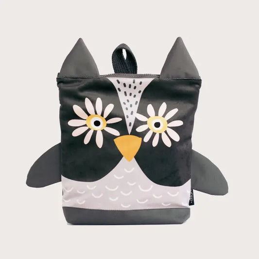 Kids backpack featuring a cartoon owl face design, adjustable beige shoulder straps, and zipper closure. Made of velvet and waterproof polyester. Available in small and large sizes.