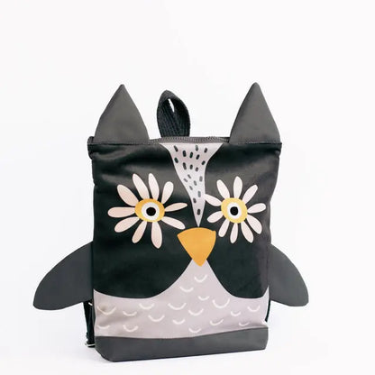 Kids backpack featuring a cartoon owl design, ideal for preschool adventures. Adjustable beige shoulder straps, velvet top, waterproof polyester bottom, and zipper closure with inside pockets. Available in small and large sizes.