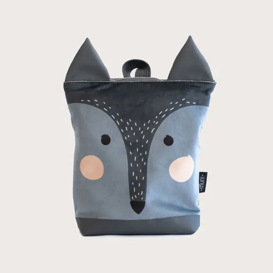 A small kids backpack featuring a wolf face design. Made of velvet and waterproof polyester, with adjustable straps and zipper closure. Ideal for young explorers aged 3-9.