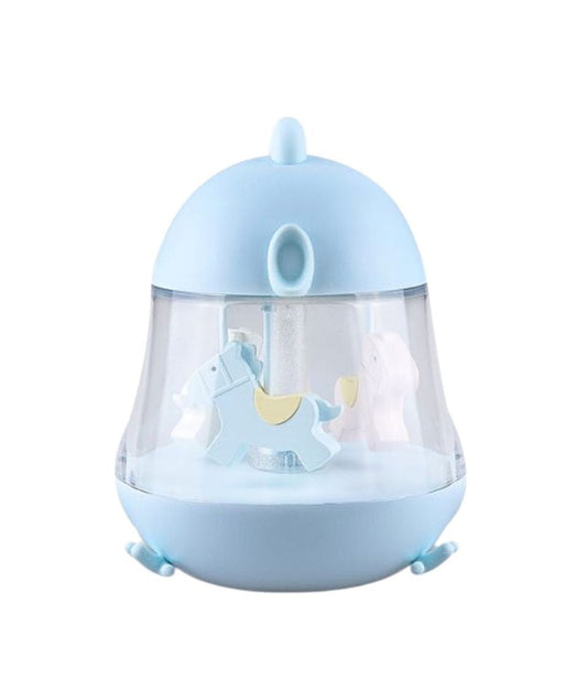 A blue and white toy lamp with carousel horses and music box. Features include 7-color lighting, 12-hour illumination, and USB charging. Dimensions: 15.4 x 12.6 x 11.4 cm.