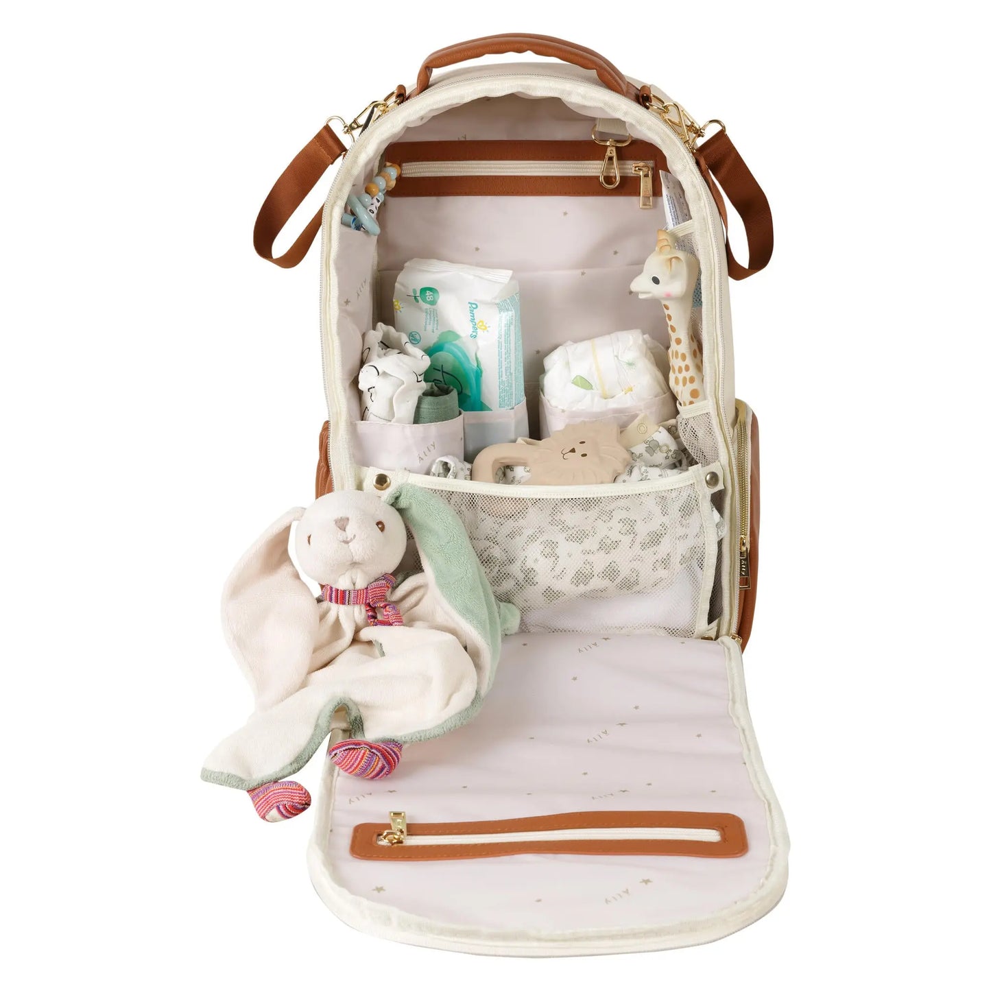 A spacious Cappuccino Diaper Bag with toys, a stuffed animal, and a stuffed toy. Designed in Europe, vegan leather, 16 pockets, laptop and baby food compartments, stroller straps for hands-free convenience.