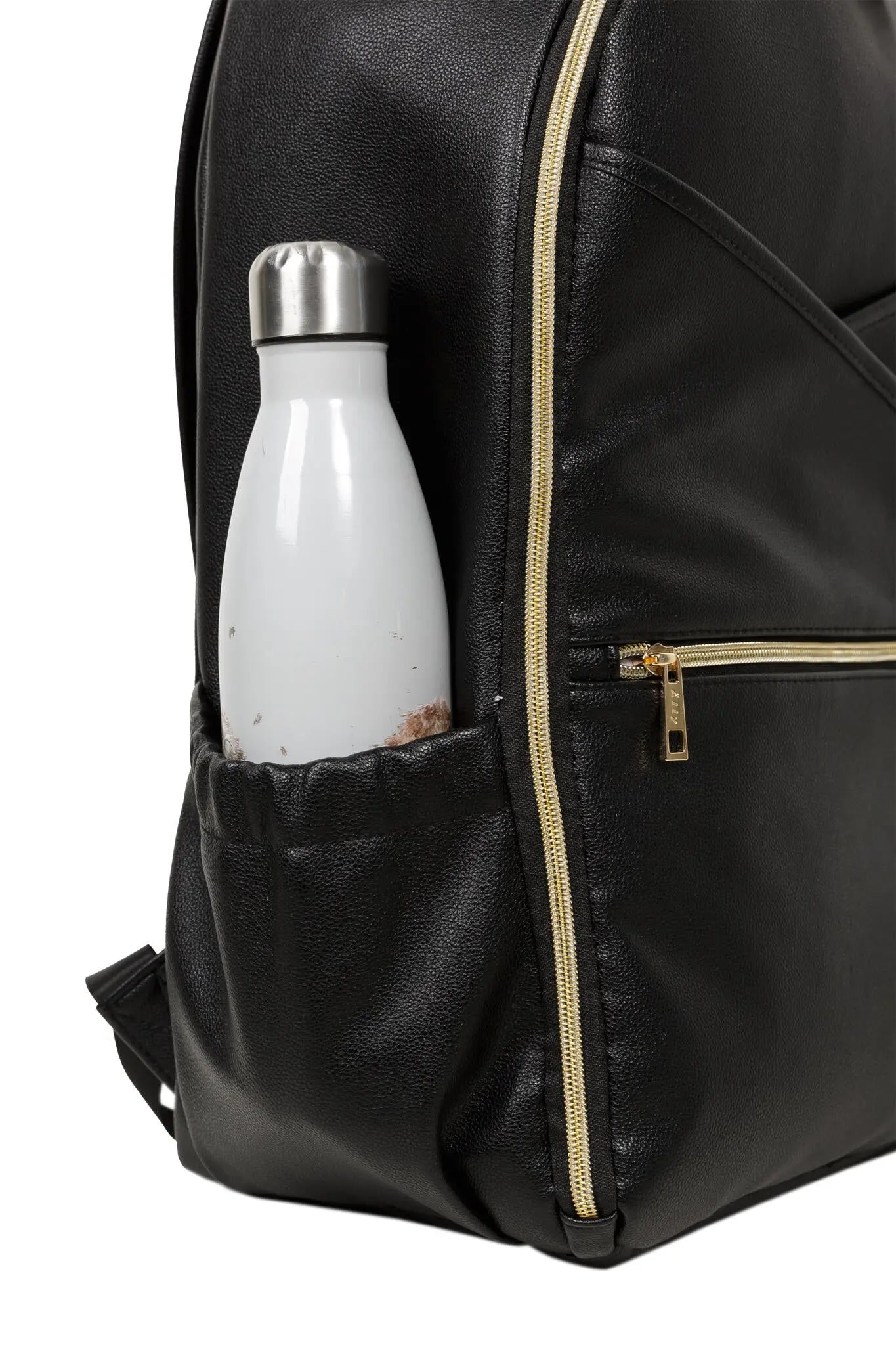 A white bottle in a black backpack, showcasing a Large Diaper Backpack – Espresso by Ally Scandic. Stylish, lightweight, and spacious with 16 pockets, laptop and baby food compartments, stroller straps, and a waterproof changing mat.