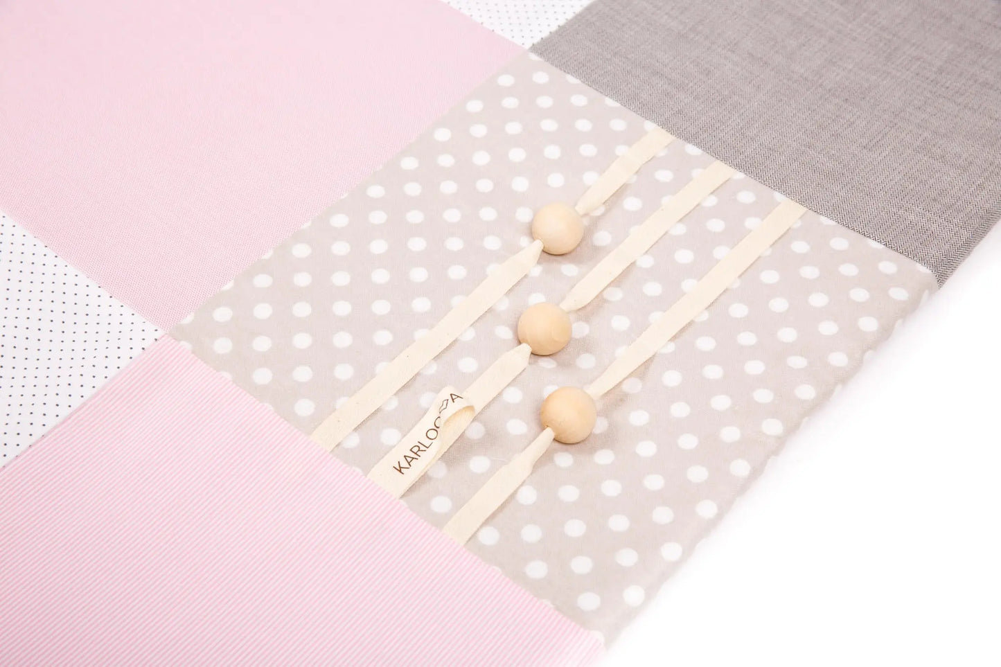 Handmade baby activity mat with arches and stimulating toys, crafted from ecologic cotton. Measures 100x100 cm. Encourage sensory exploration for newborns and up.