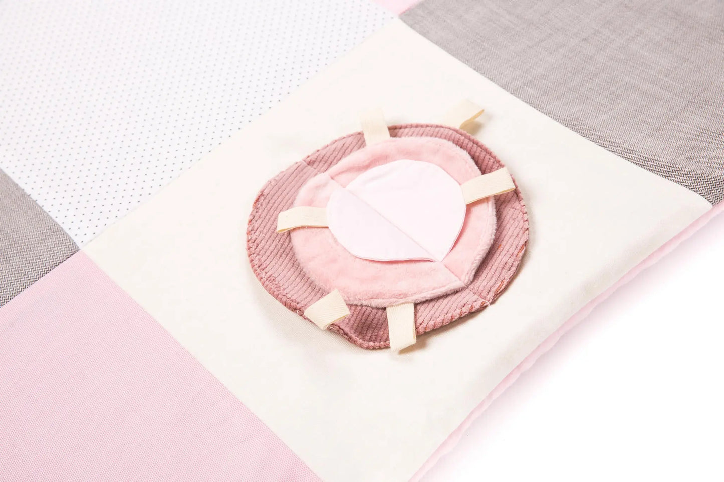 Handmade baby activity mat with arches and stimulating toys, 100x100 cm in pink. Crafted from ecologic cotton for safety and sustainability.