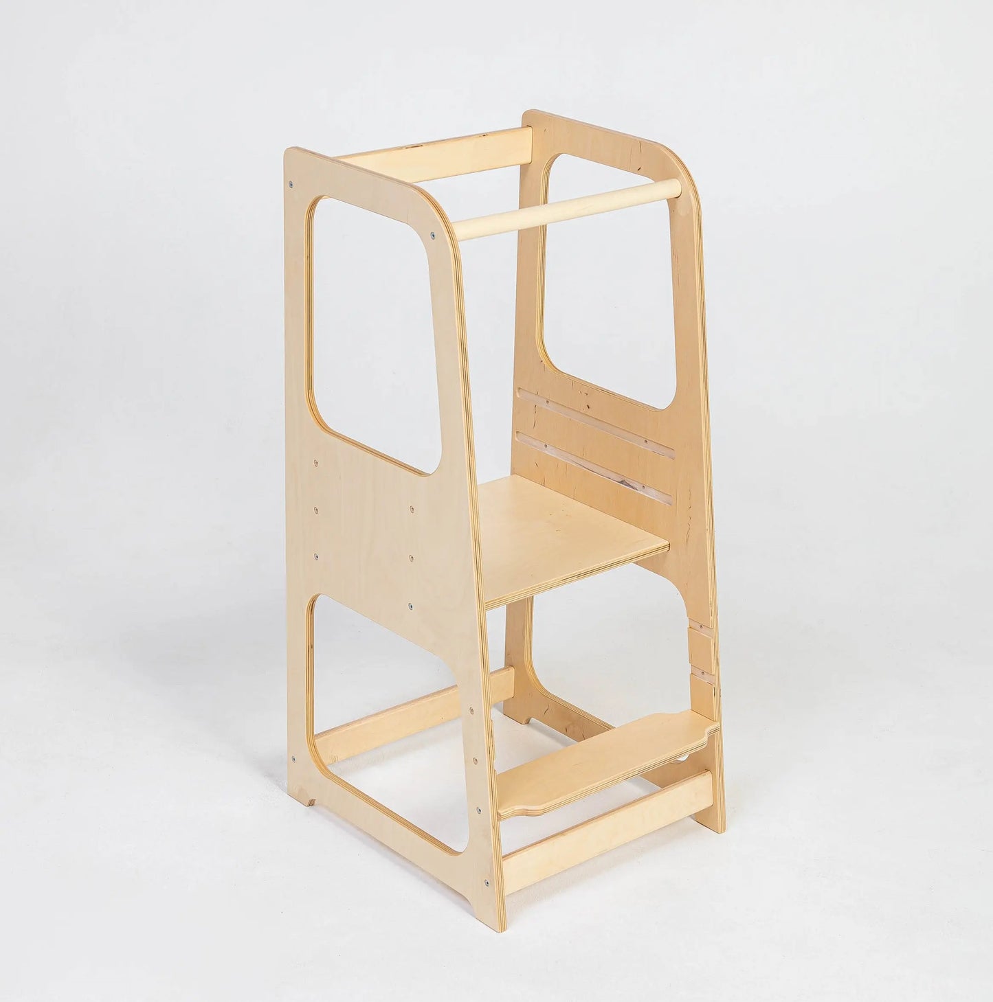 A Montessori Learning Tower Step Stool for Kids - 2-in-1 design, crafted from sturdy wood, with adjustable height levels for safe kitchen exploration.