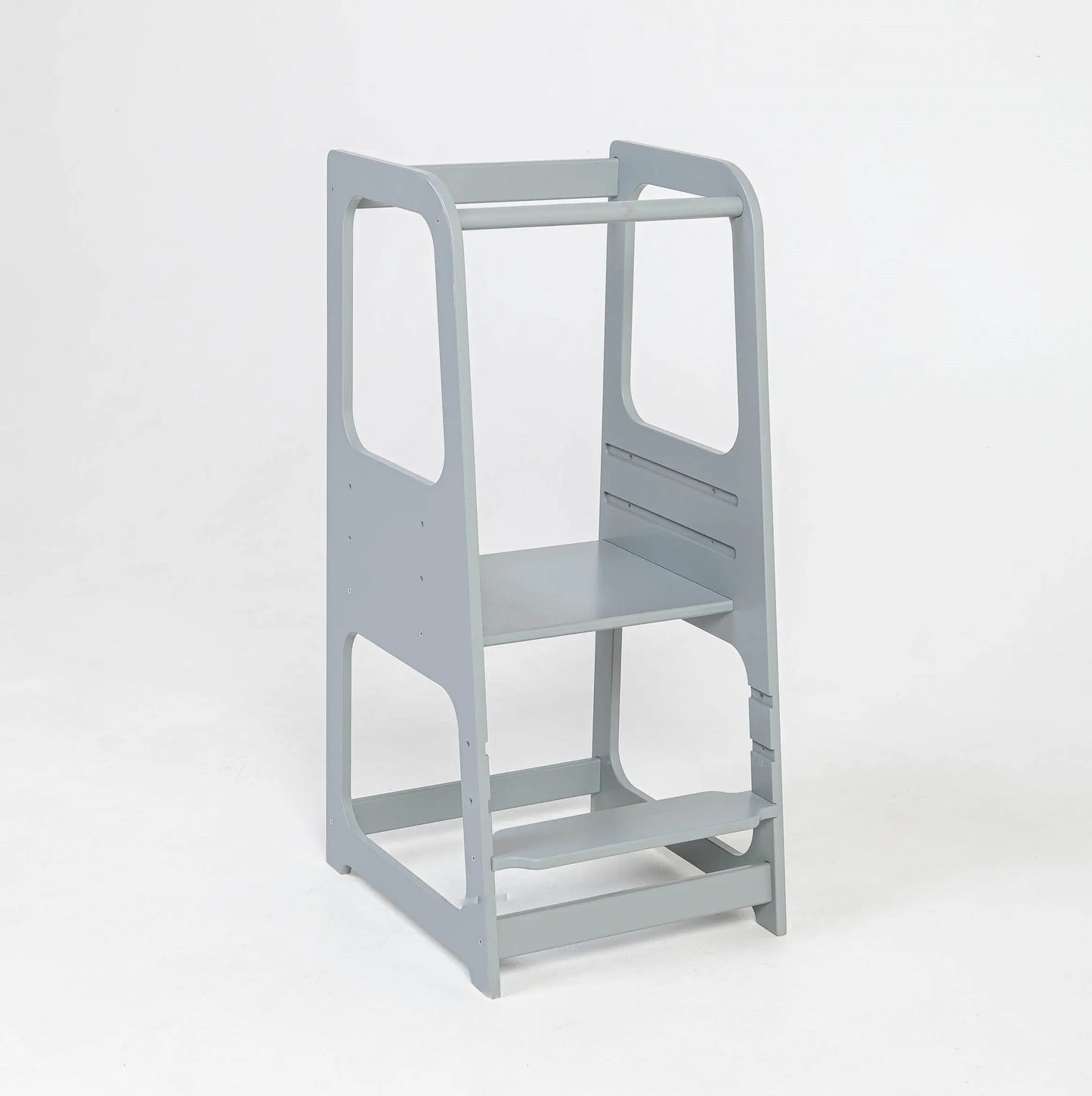 A grey ladder with two shelves and a white chair with a shelf, showcasing the Montessori Learning Tower Step Stool for Kids - 2-in-1 Combination for safe kitchen access and learning.