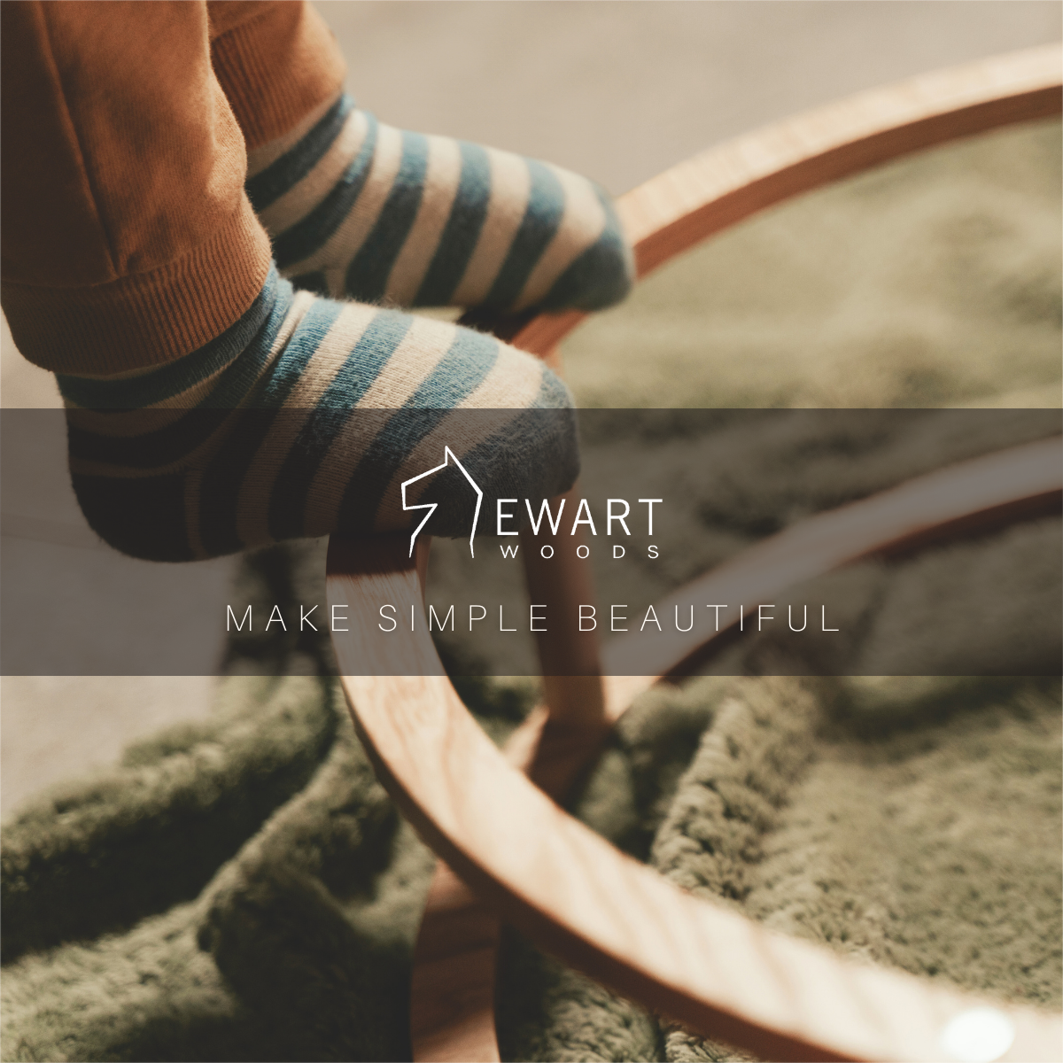 Montessori Toy Rings displayed with a person's feet in striped socks, highlighting their use for developing fine motor skills and cognitive growth through stacking.