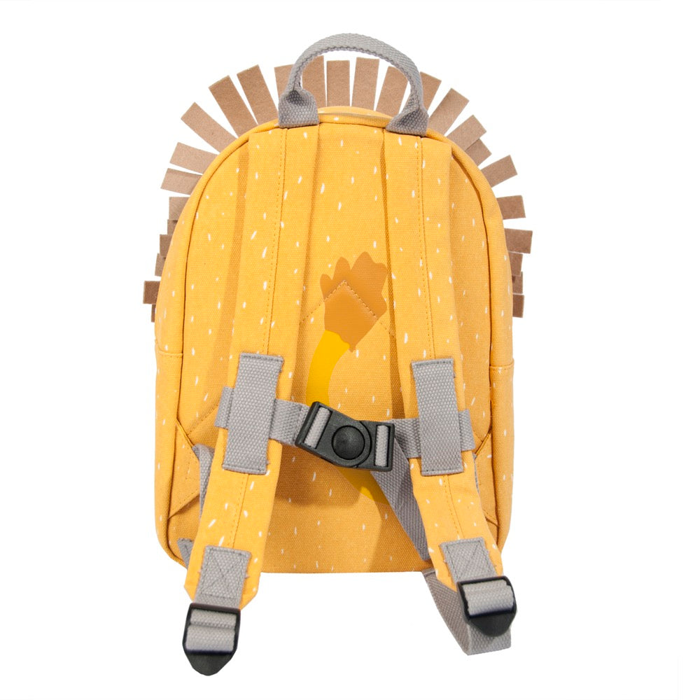 A yellow backpack featuring a playful Mr Lion design, ideal for young adventurers. Adjustable padded straps, chest strap, water-repellent coating, and spacious compartments for snacks and essentials. Dimensions: 31 x 23 x 10 cm.