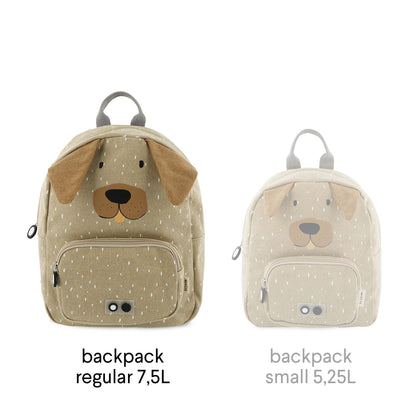 A children's backpack featuring Mr. Dog design, adjustable padded straps, chest strap, water-repellent cotton material, and 7.5L capacity. Ideal for ages 3+. Dimensions: 31 x 23 x 10 cm.