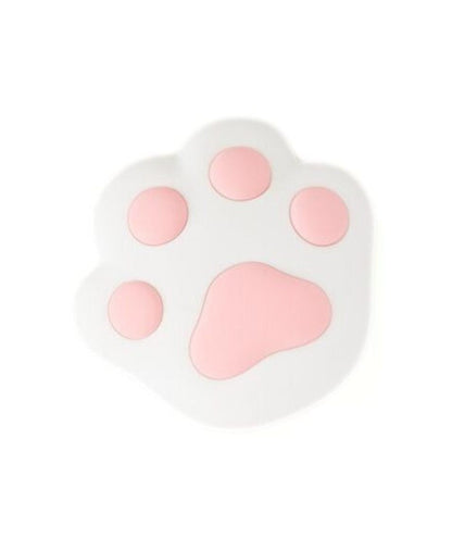 A white paw with pink dots, a paw print with pink dots, and a pink blob on a white surface, embodying the Paw Silicone Lamp - Pink's playful design. Ideal for children's rooms, offering adjustable light intensity, touch operation, and magnetic attachment.