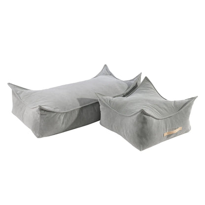 A close-up of a grey corduroy rectangular pouf for children, showcasing its durable material and innovative design with a separate filling insert. Dimensions: 120x60x35 cm.