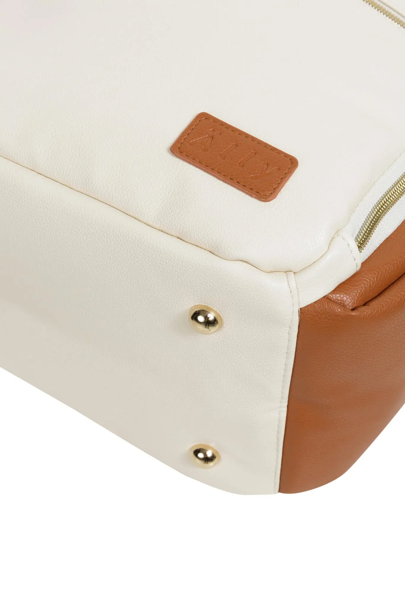 A close-up of a tan diaper backpack with a front zippered pocket, YKK zippers, and adjustable shoulder straps. Stylish, lightweight, and designed for on-the-go parents.