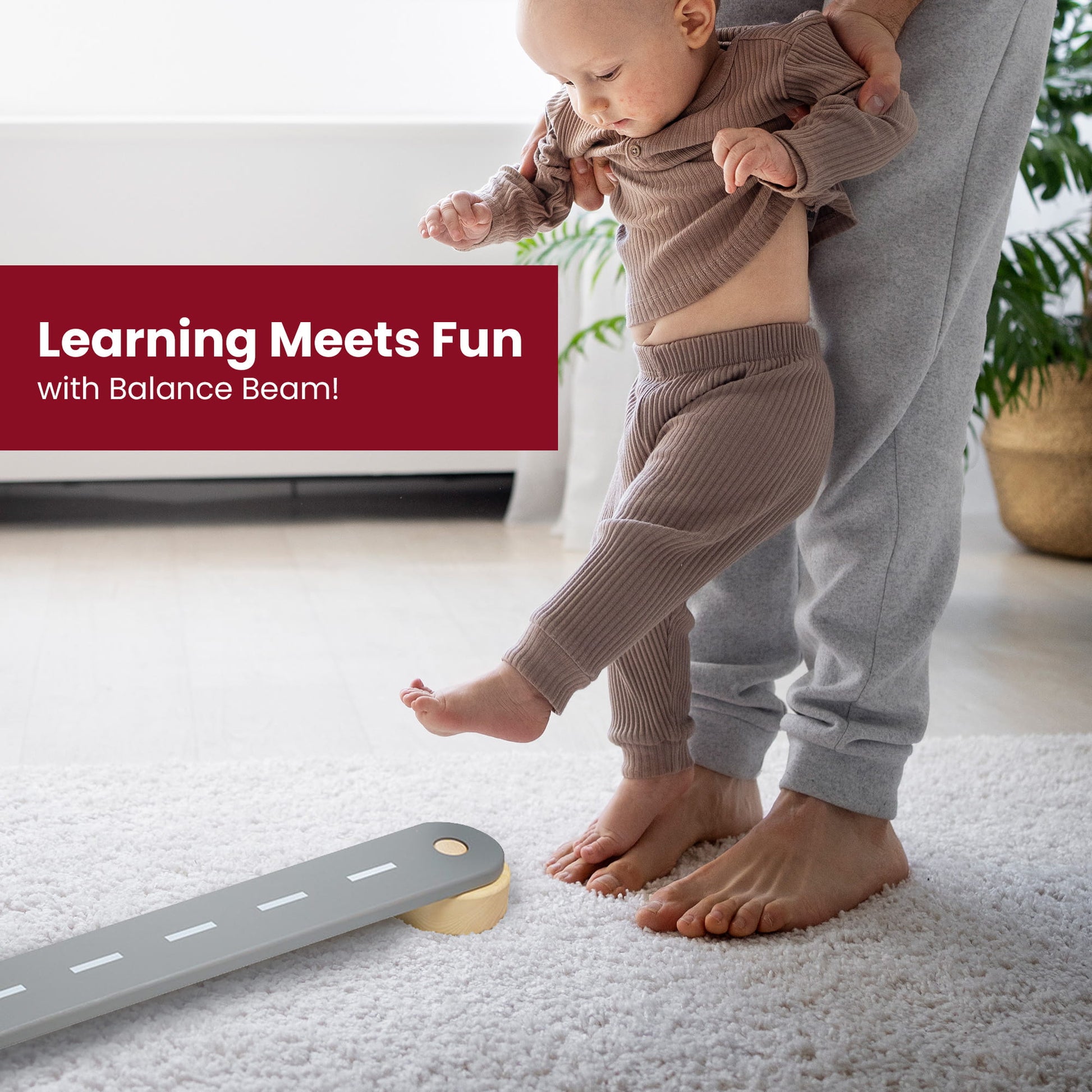 Wooden Balance Beam - 4 Elements: A baby engaging with a wooden sensory path, enhancing balance and learning numbers, shapes, and math through interactive play.