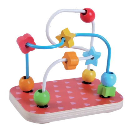 Wooden Toys Playset: A colorful toy with beads, a yellow object, and a straw on a red surface, set against a black background. Enhance motor skills and creativity with this engaging educational playset.