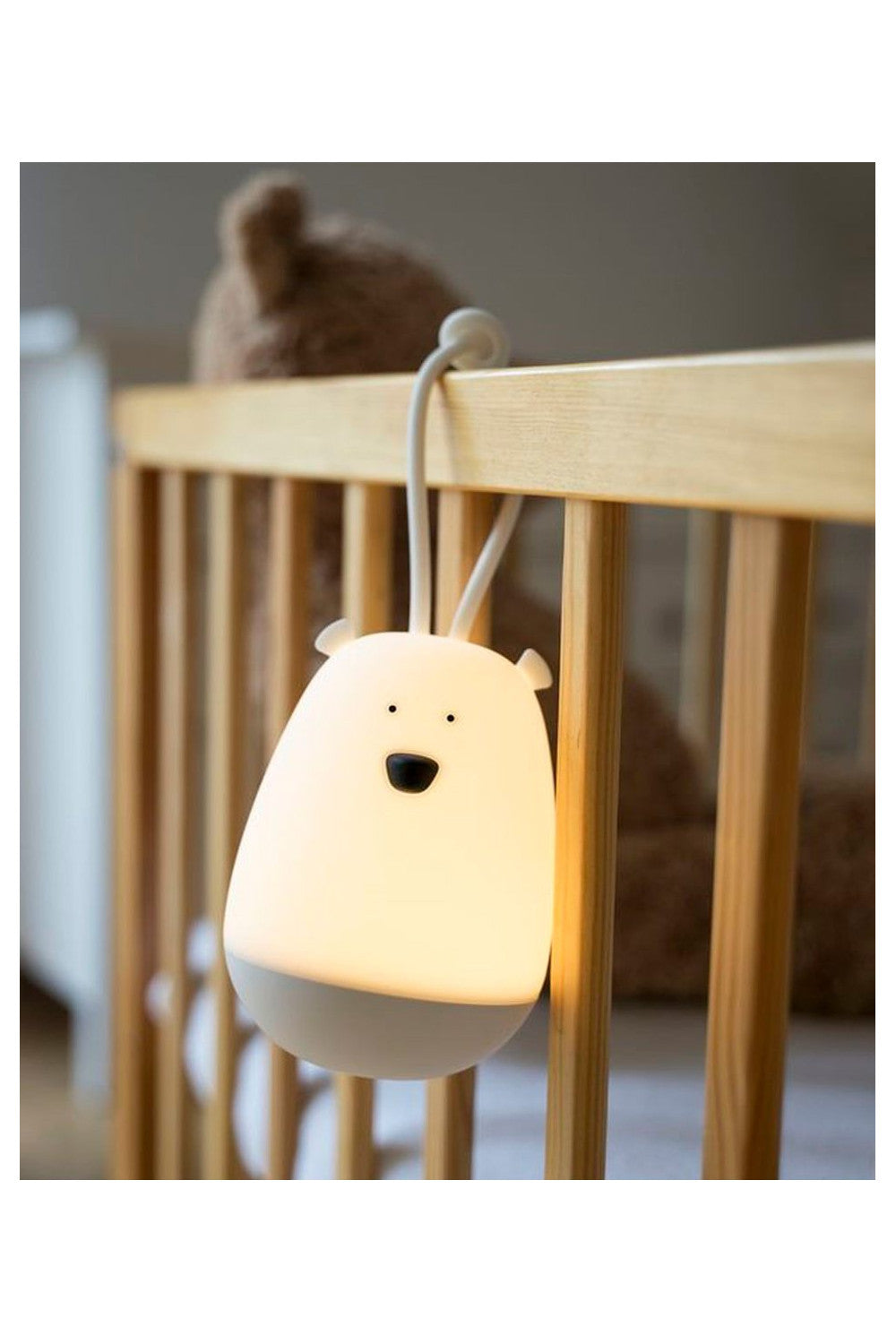 A Hanging Night Light with Remote, featuring a rabbit design, made of soft silicone, with a two-part fastening clip for easy use. Includes 7 color lighting, remote control, and USB charging.