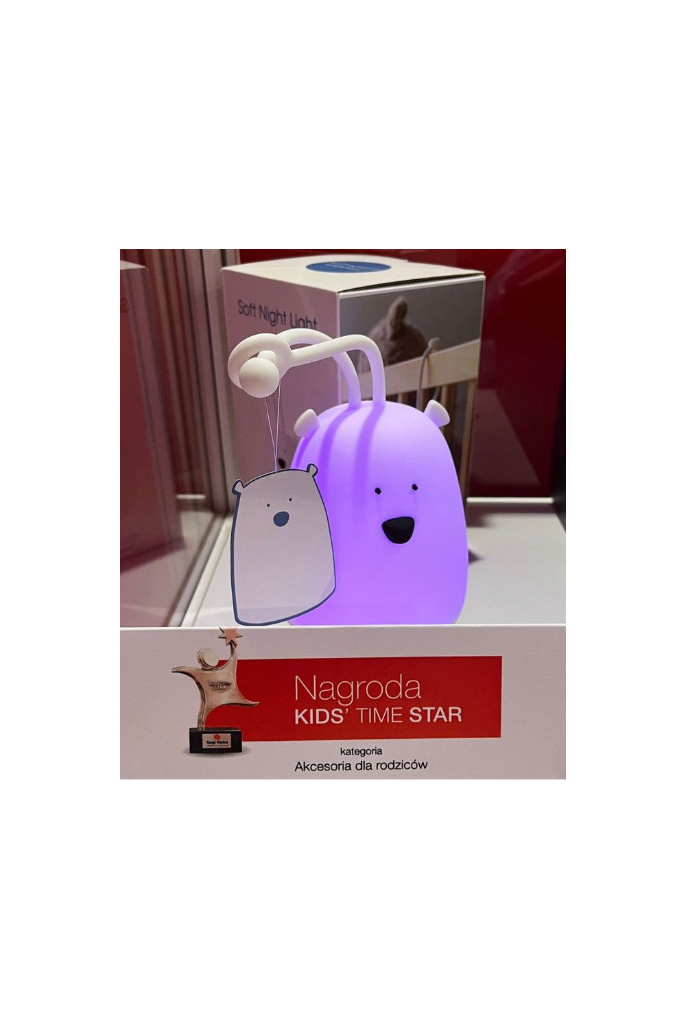 A hanging night light with a cartoon bear design, made of soft silicone, featuring a remote control, 7 color options, and auto-off function after 2 hours.