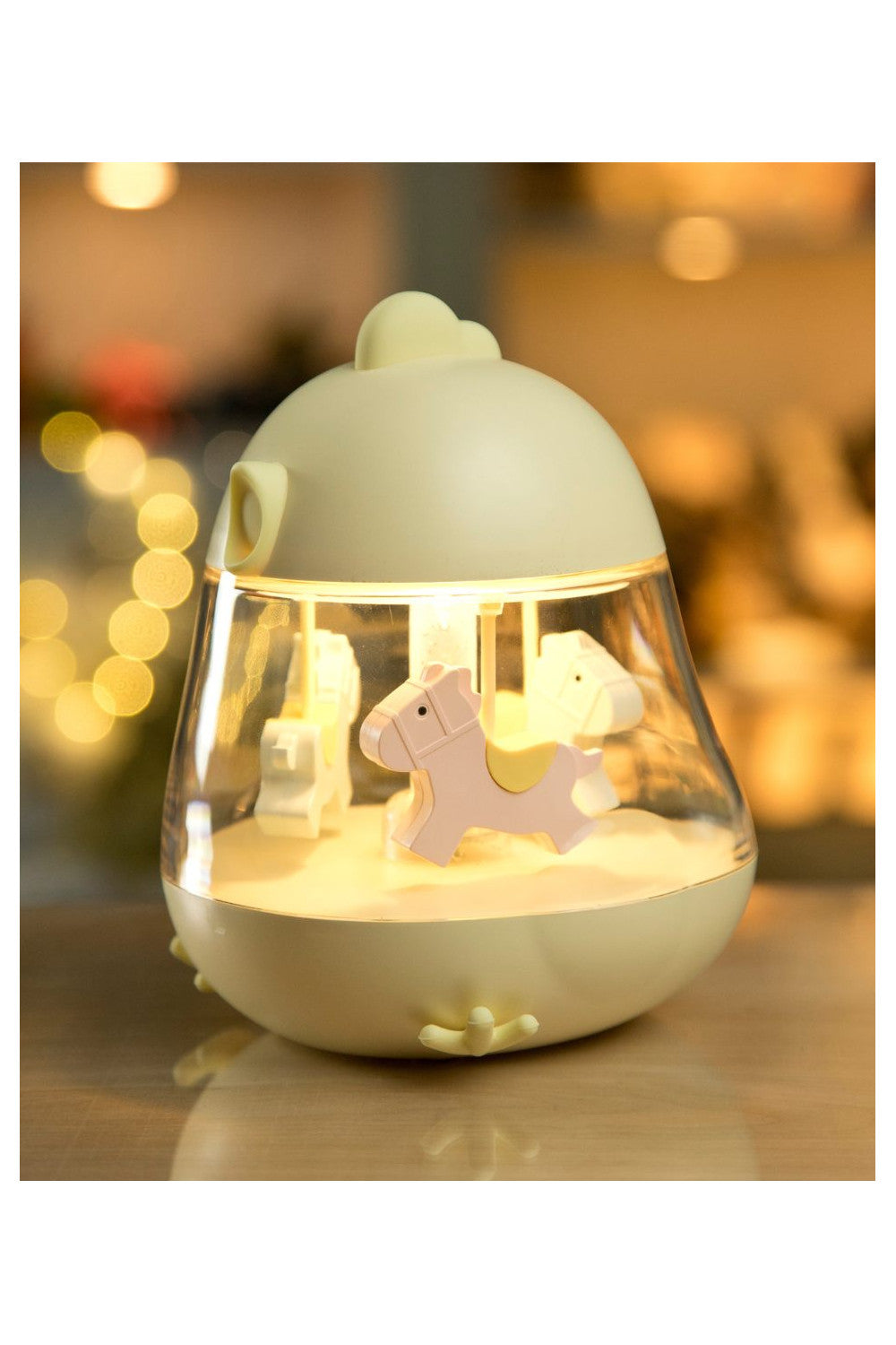 A small toy horse carousel lamp with music box, USB rechargeable. Features merry-go-round design, 7-color lighting, and sleep mode after 8 hours. Dimensions: 15.4 x 12.6 x 11.4 cm.