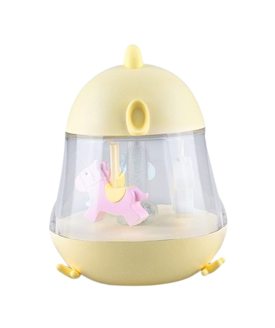 A yellow and white toy lamp with carousel and music box. Features include merry-go-round horses, 7-color lighting, and 12-hour illumination. Dimensions: 15.4 x 12.6 x 11.4 cm.