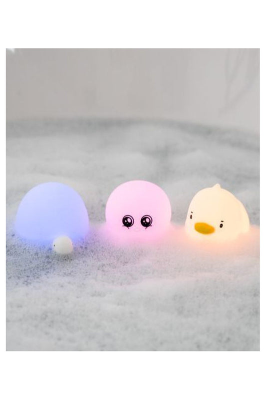 Three glowing waterproof silicone lamps in duck, octopus, and turtle shapes. Soft, touchable silicone skin, color-changing light, and 900 lighting cycles per battery. Ideal for kids' rooms and bath time.